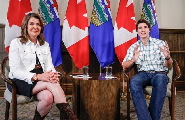 July 7, 2023, Calgary, AB, CANADA: Prime Minister Justin Trudeau, right, meets with Alberta Premier Danielle Smith in Calgary, Alta., Friday, July 7, 2023. Calgary CANADA - ZUMAc35_ 20230707_zaf_c35_029 Copyright: xJeffxMcintoshx
