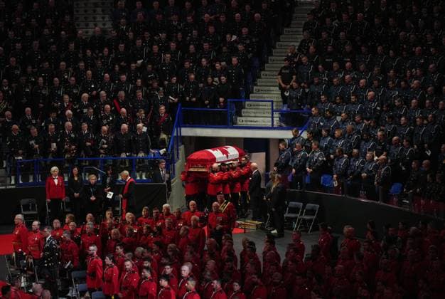 October 4, 2023, LANGLEY, BC, CANADA: Pallbearers carry RCMP Const. Rick O Brien s casket into a regimental funeral in Langley, B.C., on Wednesday, October 4, 2023. O Brien, 51, was killed last month while executing a search warrant at a home in Coquitlam. LANGLEY CANADA - ZUMAc35_ 20231004_zaf_c35_079 Copyright: xDarrylxDyckx
