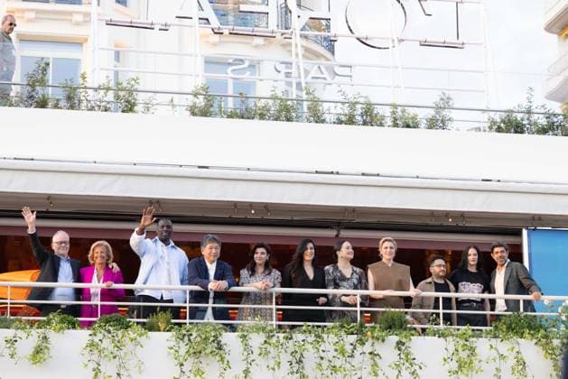 Cannes - Jury Dinner Ahead Of The Festival Opening Members of the Jury the 77th edition of the Cannes Film Festival French actor and comedian Omar Sy take a selfie with Japanese director Kore-eda Hirokazu, Turkish actress and screenwriter Ebru Ceylan, Lebanese director Nadine Labaki, US actress Lily Gladstone, US director and president of the Jury of the 77th Cannes Film Festival Greta Gerwig, Spanish director, producer, and writer Juan Antonio Bayona, French actress Eva Green and Italian actor Pierfrancesco Favino during a dinner of the jury at the Grand Hyatt Cannes Hotel Martinez, on the eve of the opening ceremony of the 77th edition of the Cannes Film Festival. The 77th Cannes Film Festival on May 13, 2024 in Cannes, France. Photo by S Copyright: xShootpix ABACAx