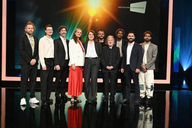 Award winners Lukas Wunschik, Markus Ott, Nicolai Mehring, Anne Jünemann, Yana Höhnerbach, Philipp Straetker, Rainer Klausmann, Noah Böhm, Daniel Guliyev, Christopher Aoun, l r, posing on stage at the award ceremony 34 German Camera Award