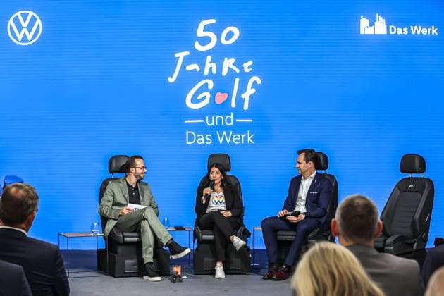 Ceremony 50 years of Golf production at Volkswagen in Wolfsburg Ceremony 50 years of Golf production, event room, stage, panel discussion, from left, Jesko Giessen, moderator, Daniela Cavallo, Chairwoman of the General and Group Works Council Volkswagen AG, Thomas Schäfer, CEO of the Volkswagen Passenger Cars brand, Member of t