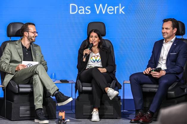 Ceremony 50 years of Golf production at Volkswagen in Wolfsburg Ceremony 50 years of Golf production, event room, stage, panel discussion, from left, Jesko Giessen, moderator, Daniela Cavallo, Chairwoman of the General and Group Works Council Volkswagen AG, Thomas Schäfer, CEO of the Volkswagen Passenger Cars brand, Member of t