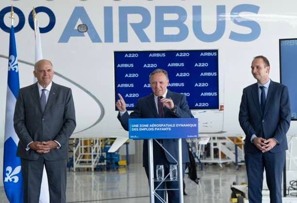 July 23, 2024, Montreal, Pq, Canada: Quebec Premier Francois Legault, speaks as Airbus Canada President Benoit Schultz, right, Quebec Economy Minister Pierre FitzGibbons, left, look on at the Airbus A220 manufacturing facility in Mirabel, Que., Tuesday, July 23, 2024. The Quebec government is investing $410 million to increase production at the plant. Montreal Canada - ZUMAc35_ 20240723_zaf_c35_025 Copyright: xRyanxRemiorzx