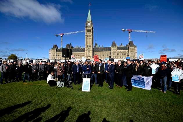 October 10, 2024, Ottawa, On, CAN: Bloc Quebecois Leader Yves-Francois Blanchet, centre, speaks at a news conference on the lawn of Parliament Hill in Ottawa, on Thursday, Oct. 10, 2024. Members of Parliament from the Bloc Quebecois, Liberal, NDP and Green Parties, federal cabinet ministers and agriculture producers participated in the event to urge the Senate to pass Bill C-282, a Bloc private member s bill on supply management. Ottawa CAN - ZUMAc35_ 20241010_zaf_c35_051 Copyright: xJustinxTangx