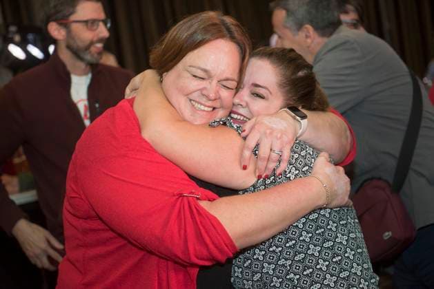 October 21, 2024, Fredericton, Nb, Canada: Hannah Fulton Johnston, executive director of the New Brunswick Liberal Association, left, and Janick Cormier, vice president, hug each other when it was announced that the liberals won the election in Fredericton, Monday, Oct. 21, 2024. Fredericton Canada - ZUMAc35_ 20241021_zaf_c35_115 Copyright: xStephenxMacgillivrayx