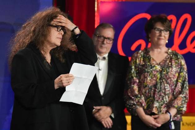 November 18, 2024, Toronto, Ontario, Canada: ANNE MICHAELS, 66, accepts the Giller Prize of $100,000 for her book Held a multigenerational look at war and trauma spanning more than a century. The jury cited the novel as an impactful and hypnotic exploration of mortality, resilience and desires, at ceremony in Toronto, Monday. Award boycotted by several prominent Canadian authors over its sponsors’ ties to Israel. Based in Toronto, Michaels a poet and author. In her acceptance speech, said that her writing is a way of bearing witness against war, indifference, against amnesia of every sort. Toronto Canada - ZUMAc35_ 20241118_zaf_c35_178 Copyright: xChrisxYoungx