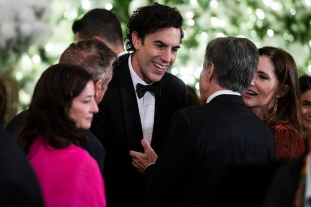 Kennedy Center Honorees UNITED STATES - DECEMBER 4: Sacha Baron Cohen, center, talks with Secretary of State Antony Blinken during the Kennedy Center Honorees reception in the East Room of the White House on Sunday, December 4, 2022. The honorees were George Clooney, Amy Grant, Gladys Knight, Tania Leon, and the band members of U2, Bono, The Edge, Adam Clayton, and Larry Mullen, Jr. (Tom Williams CQ Roll Call) Washington DC United States EDITORIAL USE ONLY Copyright: x2022xCQ-RollxCall,xInc.x TomxWilliamsx rollcallpix149426