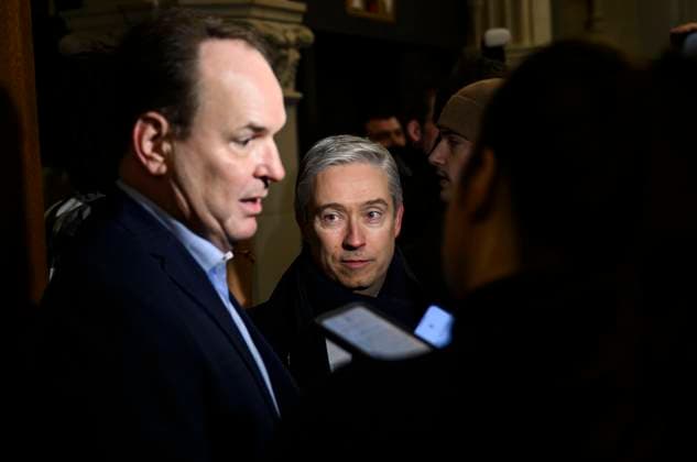 January 8, 2025, Ottawa, On, CANADA: Minister of Innovation, Science and Industry Francois-Philippe Champagne, centre, listens to Minister of Employment, Workforce Development and Labour Steven MacKinnon speak to journalists as he makes his way to Liberal Party caucus meeting in West Block on Parliament Hill, in Ottawa, Wednesday, Jan. 8, 2025. Ottawa CANADA - ZUMAc35_ 20250108_zaf_c35_022 Copyright: xJustinxTangx