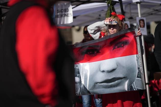 February 14, 2025, Vancouver, Bc, CANADA: Diamond Poorman, holds a banner with a photograph of her late sister, Chelsea Poorman, 24, during the annual Women s Memorial March, in Vancouver, on Friday, February 14, 2025. Poorman s body was found outside an empty multi-million dollar mansion by a construction worker in 2022. The march is held to honour missing and murdered Indigenous women and girls from the community with stops along the way to commemorate where women were last seen or found. Vancouver CANADA - ZUMAc35_ 20250214_zaf_c35_115 Copyright: xDarrylxDyckx