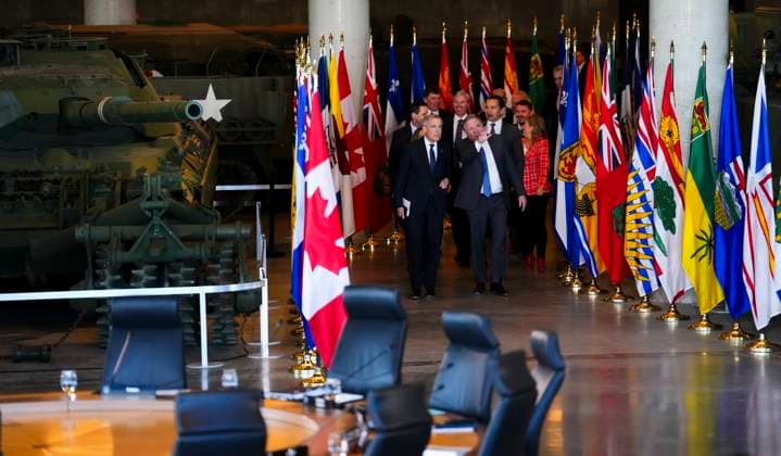 March 21, 2025, Ottawa, Ontario, Canada: Prime Minister Mark Carney, front, walks alongside Francois Legault, Premier of Quebec, as they are joined by first ministers as they arrives to take part in the First Minister Meeting at the National War Museum in Ottawa on Friday, March 21, 2025. Ottawa Canada - ZUMAc35_ 20250321_zaf_c35_066 Copyright: xSeanxKilpatrickx