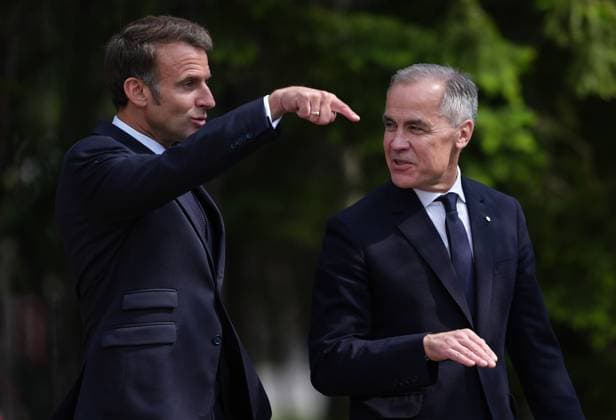 June 16, 2025, Kananaskis, Ab, CANADA: French President Emmanuel Macron, left, and Canadian Prime Minister Mark Carney walk to a meeting after officially welcoming Macron to the G7 Summit in Kananaskis, Alta., on Monday, June 16, 2025. Kananaskis CANADA - ZUMAc35_ 20250616_zaf_c35_071 Copyright: xDarrylxDyckx
