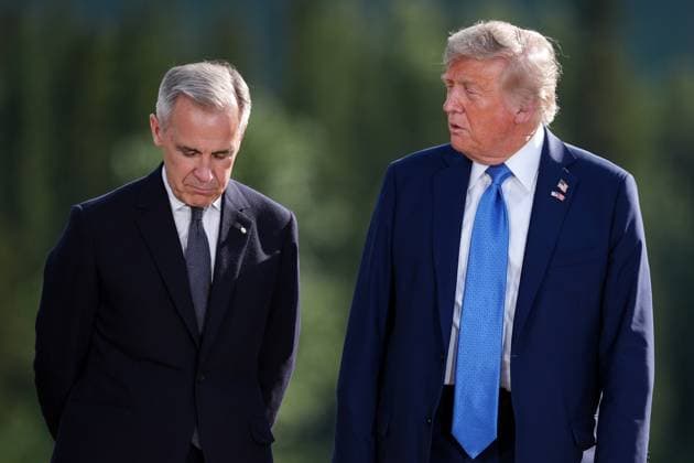 June 16, 2025, Kananaskis, Ab, CANADA: Prime Minister Mark Carney, left, listens to U.S. President Donald Trump while posing for the family photograph during the G7 Summit in Kananaskis, Alta., Monday, June 16, 2025. Kananaskis CANADA - ZUMAc35_ 20250616_zaf_c35_251 Copyright: xDarrylxDyckx