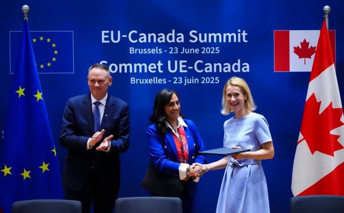 June 23, 2025, Brussels, Belgium: Minister of Foreign Affairs Anita Anand, centre, Minister of National Defence David McGuinty, left, take part in a signing ceremony with European Union foreign policy chief Kaja Kallas during the Canada EU Summit in Brussels, Belgium on Monday, June 23, 2025. Brussels Belgium - ZUMAc35_ 20250623_zaf_c35_059 Copyright: xSeanxKilpatrickx