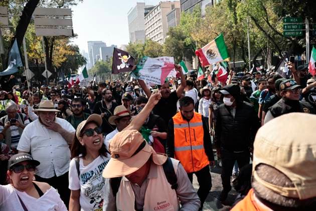November 20, 2025, Mexico, Cdmx, Mexico: A group of approximately one hundred members of Generation Z, or Gen Z, marched down Paseo de la Reforma Avenue to protest the insecurity, corruption, and drug trafficking plaguing the country. They were intercepted by city police (riot police), who blocked their progress due to the ongoing military parade commemorating the anniversary of the Mexican Revolution. They were detained for a couple of hours until the police allowed them to proceed toward the Zo³calo, Mexico City s main square. However, the police again blocked their path one block before they reached the Plaza de la Constitucio³n. The protest was peaceful, with members of the Black Bloc once again using the One Piece flag, a Japanese - ZUMAp204 20251120_zip_p204_016 Copyright: xJosuexPerezx