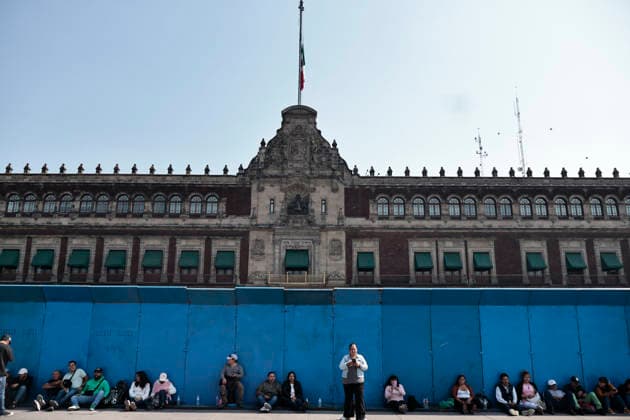 November 25, 2025, Mexico, Cdmx, Mexico: The government of President CLAUDIA SHEIMBAUM covered the buildings surrounding the National Palace with metal barriers to prevent damage during the demonstration for the International Day for the Elimination of Violence against Women, also known as 25N. Additionally, city police are deployed in the streets surrounding the Zo³calo in Mexico City to contain any potential attacks, along with firefighters with extinguishers and emergency medical teams. As of September of this year, 513 cases of femicide have been registered in Mexico. The states with the highest incidence are the State of Mexico, which has a double gender violence alert, making it the most dangerous place to be a woman in the enti - ZUMAp204 20251125_zip_p204_009 Copyright: xJosuexPerezx