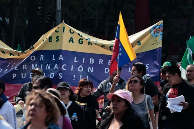 January 10, 2026, Mexico City, Cdmx, Mexico: Mexican protesters and social organizations are demonstrating against the actions of US President DONALD TRUMP against Venezuela and its former president, NICOLAS MADURO. With posters, giant banners, and Venezuelan flags, they are showing their support for MADURO and his vice president, DELCY RODRIGUEZ, who has assumed the presidency due to the country s situation. Chanting slogans like Yankees out of Latin America and Trump, imperialist terrorist, the protesters are demanding the immediate release of NICOLAS MADURO, whom they claim is being held captive by DONALD TRUMP. This comes as protests against these actions spread worldwide, with many believing TRUMP S true objective is to seize V - ZUMAp204 20260110_zip_p204_020 Copyright: xJosuexPerezx