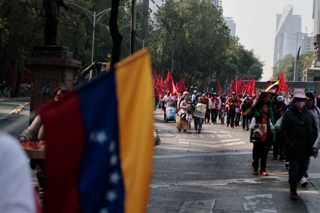 January 10, 2026, Mexico City, Cdmx, Mexico: Mexican protesters and social organizations are demonstrating against the actions of US President DONALD TRUMP against Venezuela and its former president, NICOLAS MADURO. With posters, giant banners, and Venezuelan flags, they are showing their support for MADURO and his vice president, DELCY RODRIGUEZ, who has assumed the presidency due to the country s situation. Chanting slogans like Yankees out of Latin America and Trump, imperialist terrorist, the protesters are demanding the immediate release of NICOLAS MADURO, whom they claim is being held captive by DONALD TRUMP. This comes as protests against these actions spread worldwide, with many believing TRUMP S true objective is to seize V - ZUMAp204 20260110_zip_p204_024 Copyright: xJosuexPerezx