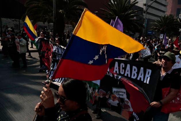 January 10, 2026, Mexico City, Cdmx, Mexico: Mexican protesters and social organizations are demonstrating against the actions of US President DONALD TRUMP against Venezuela and its former president, NICOLAS MADURO. With posters, giant banners, and Venezuelan flags, they are showing their support for MADURO and his vice president, DELCY RODRIGUEZ, who has assumed the presidency due to the country s situation. Chanting slogans like Yankees out of Latin America and Trump, imperialist terrorist, the protesters are demanding the immediate release of NICOLAS MADURO, whom they claim is being held captive by DONALD TRUMP. This comes as protests against these actions spread worldwide, with many believing TRUMP S true objective is to seize V - ZUMAp204 20260110_zip_p204_032 Copyright: xJosuexPerezx