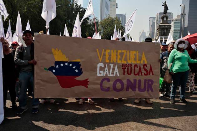 January 10, 2026, Mexico City, Cdmx, Mexico: Mexican protesters and social organizations are demonstrating against the actions of US President DONALD TRUMP against Venezuela and its former president, NICOLAS MADURO. With posters, giant banners, and Venezuelan flags, they are showing their support for MADURO and his vice president, DELCY RODRIGUEZ, who has assumed the presidency due to the country s situation. Chanting slogans like Yankees out of Latin America and Trump, imperialist terrorist, the protesters are demanding the immediate release of NICOLAS MADURO, whom they claim is being held captive by DONALD TRUMP. This comes as protests against these actions spread worldwide, with many believing TRUMP S true objective is to seize V - ZUMAp204 20260110_zip_p204_046 Copyright: xJosuexPerezx