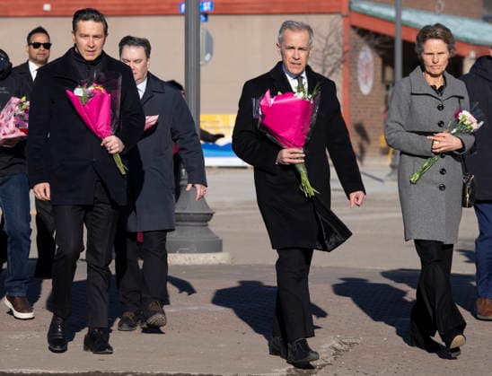 February 13, 2026, Tumbler Ridge, Bc, CANADA: Conservative Leader Pierre Poilievre, left to right, Prime Minister Mark Carney and Diana Fox Carney arrive at a memorial for the victims of a mass shooting, in Tumbler Ridge, B.C., Friday, Feb. 13, 2026. Tumbler Ridge CANADA - ZUMAc35_ 20260213_zaf_c35_142 Copyright: xChristinnexMuschix