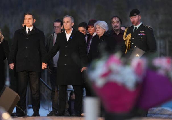 February 13, 2026, Tumbler Ridge, Bc, CANADA: Left to right, Leader of the Official Opposition of Canada Pierre Poilievre, Prime Minister Mark Carney and ..Governor General of Canada, Mary Simon join hands while ..attending a vigil for the victims of a mass shooting, in Tumbler Ridge, B.C., Friday, Feb. 13, 2026. Tumbler Ridge CANADA - ZUMAc35_ 20260213_zaf_c35_163 Copyright: xChristinnexMuschix