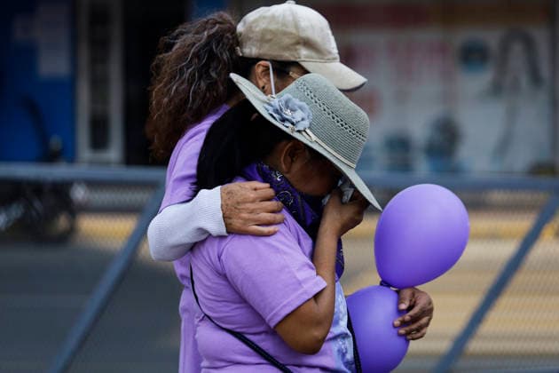 March 8, 2026, ChimalhuacaN, State Of Mexico, Mexico: Women weep beneath the statue of the Chimalli Warrior, where mothers and relatives of missing women and victims of femicide marched to the municipal seat of Chimalhuacan in the State of Mexico to demand justice and punishment for the perpetrators, on the occasion of International Women s Day in Mexico. According to the United Nations, International Women s Day is commemorated in many countries around the world. When women from all continents, often separated by national borders and ethnic, linguistic, cultural, economic and political differences, come together on this day, they can contemplate a tradition of no less than ninety years of struggle for equality, justice, peace and develop - ZUMAs197 20260308_aaa_s197_490 Copyright: xGerardoxVieyrax