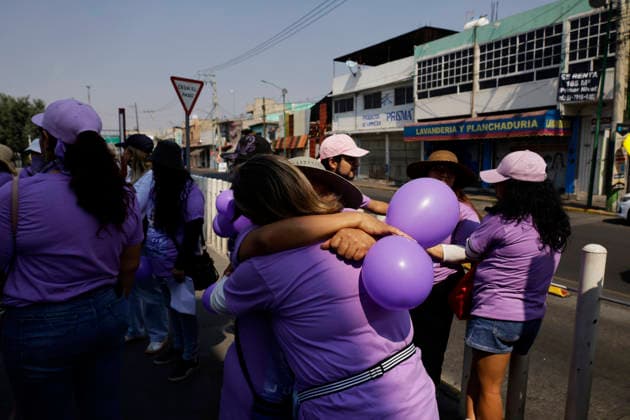 March 8, 2026, ChimalhuacaN, State Of Mexico, Mexico: Mothers and relatives of missing women and victims of femicide embraced beneath the statue of the Chimalli Warrior, after marching to the municipal seat of Chimalhuacan in the State of Mexico to demand justice and punishment for the perpetrators, on the occasion of International Women s Day in Mexico. According to the United Nations, International Women s Day is commemorated in many countries around the world. When women from all continents, often separated by national borders and ethnic, linguistic, cultural, economic and political differences, come together on this day, they can contemplate a tradition of no less than ninety years of struggle for equality, justice, peace and developm - ZUMAs197 20260308_aaa_s197_497 Copyright: xGerardoxVieyrax