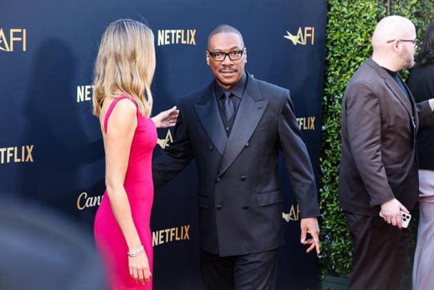 April 18, 2026, Hollywood, California, USA: American Actor and Comedian EDDIE MURPHY, 65, and his Australian Actress wife PAIGE BUTCHER, 46, in a Barbie-pink dress, is on the Red Carpet before Murphy receives the American Film Instituteâ€⠢s (AFI) Life Time Achievement Award on April 18, 2026 in Hollywood, California at the Dolby Theater, Los Angeles. The event is sponsored by Netflix. Hollywood USA - ZUMAk144 20260418_znp_k144_004 Copyright: xAmyxKatzx