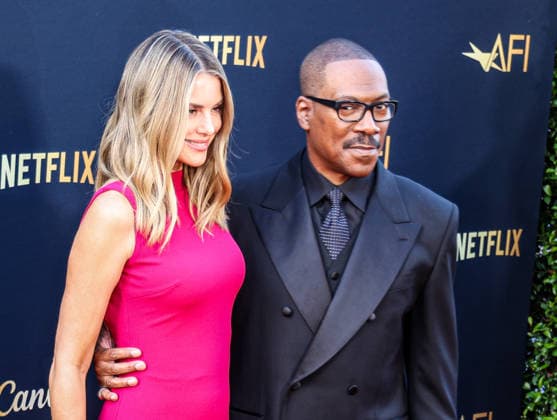 April 18, 2026, Hollywood, California, USA: American Actor and Comedian EDDIE MURPHY, 65, and his Australian Actress wife PAIGE BUTCHER, 46, in a Barbie-pink dress, is on the Red Carpet before Murphy receives the American Film Instituteâ€⠢s (AFI) Life Time Achievement Award on April 18, 2026 in Hollywood, California at the Dolby Theater, Los Angeles. The event is sponsored by Netflix. Hollywood USA - ZUMAk144 20260418_znp_k144_006 Copyright: xAmyxKatzx