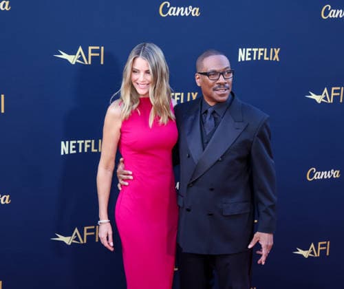 April 18, 2026, Hollywood, California, USA: American Actor and Comedian EDDIE MURPHY, 65, and his Australian Actress wife PAIGE BUTCHER, 46, in a Barbie-pink dress, is on the Red Carpet before Murphy receives the American Film Instituteâ€⠢s (AFI) Life Time Achievement Award on April 18, 2026 in Hollywood, California at the Dolby Theater, Los Angeles. The event is sponsored by Netflix. Hollywood USA - ZUMAk144 20260418_znp_k144_013 Copyright: xAmyxKatzx