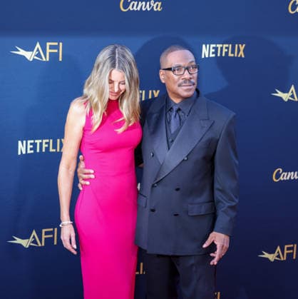 April 18, 2026, Hollywood, California, USA: American Actor and Comedian EDDIE MURPHY, 65, and his Australian Actress wife PAIGE BUTCHER, 46, in a Barbie-pink dress, is on the Red Carpet before Murphy receives the American Film Instituteâ€⠢s (AFI) Life Time Achievement Award on April 18, 2026 in Hollywood, California at the Dolby Theater, Los Angeles. The event is sponsored by Netflix. Hollywood USA - ZUMAk144 20260418_znp_k144_015 Copyright: xAmyxKatzx