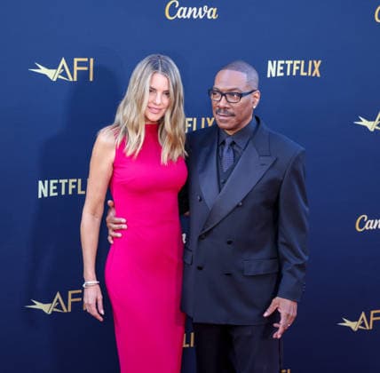April 18, 2026, Hollywood, California, USA: American Actor and Comedian EDDIE MURPHY, 65, and his Australian Actress wife PAIGE BUTCHER, 46, in a Barbie-pink dress, is on the Red Carpet before Murphy receives the American Film Instituteâ€⠢s (AFI) Life Time Achievement Award on April 18, 2026 in Hollywood, California at the Dolby Theater, Los Angeles. The event is sponsored by Netflix. Hollywood USA - ZUMAk144 20260418_znp_k144_017 Copyright: xAmyxKatzx