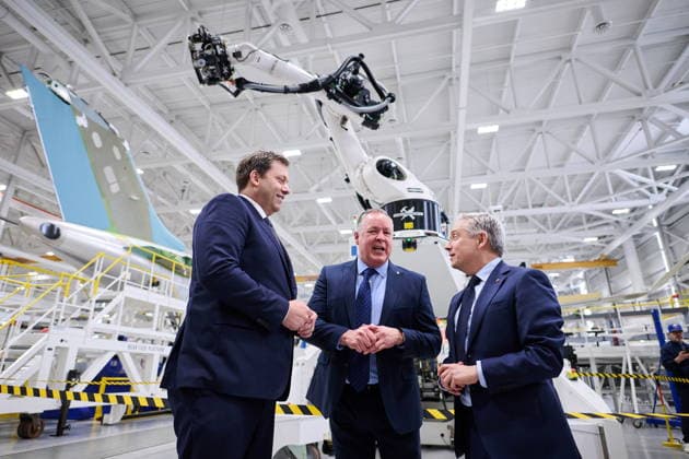 May 8, 2026, Toronto, On, Canada: German Vice-Chancellor and Federal Minister of Finance Lars Klingbeil, left to right, Bombardier vice-president of operations Graham Kelly and Minister of Finance and National Revenue Francois-Philippe Champagne speak in front of a robotic jet plane assembly arm during a tour of Bombardier s aircraft assembly centre in Mississauga, Ont., on Friday, May 8, 2026. Toronto Canada - ZUMAc35_ 20260508_zaf_c35_040 Copyright: xSammyxKoganx