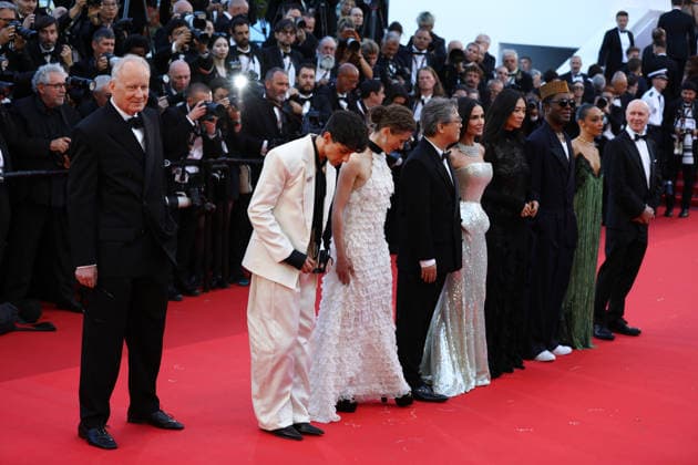 May 12, 2026, Cannes, Cote D azur, France: Jury members RUTH NEGGA, ISAACH DE BANKOLE, CHLOE ZHAO, DEMI MOORE, President PARK CHAN-WOOK, LAURA WANDEL, DIEGO CESPEDES, STELLAN SKARSGARD and PAUL LAVERTY during the red carpet for the premiere screening of THE ELECTRIC KISS at the 79th Annual Cannes Film Festival at Palais des Festivals in Cannes, France Cannes France - ZUMAc179 20260512_zep_c179_094 Copyright: xMickaelxChavetx