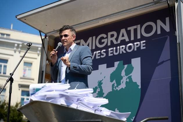July 15, 2026, Brussels, Belgium: BRUSSELS, BELGIUM †JULY 2026: Far-right activists Martin Sellner, Eva Vlaardingerbroek, Dries Van Langenhove, Andrea Ballarati and Lucy White joined MEPs Dominik TarczyAski, Sebastian Tynkkynen, Geadis Geadi and 200 participants at the Save Europe Act rally in Place du Luxembourg on Wednesday. They later marched to the entrance of the European Parliament, where organizers symbolically delivered more than 500,000 printed signatures supporting their Save Europe Act initiative in a wheelbarrow. JNA Press. Brussels Belgium - ZUMAq101 20260715_zna_q101_170 Copyright: xRaduxIonescux