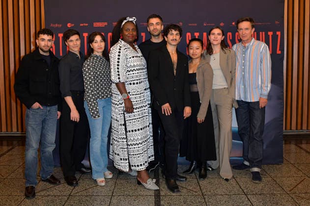Ali Reza Ahmadi, Sebastian Urzendowsky, Kathrin Angerer, Mercy Dorcas Otieno, Jorgo Narjes, Faraz Shariat, Chen Emilie Yan, Paulina Lorenz, and Arnd Klawitter at the special screening of the film *Staatsschutz* at Kino International in Berlin, August 25, 2026 Foto:xM.xBehrensx xFuturexImagex staatsschutz_6848