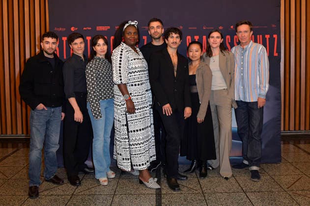 Ali Reza Ahmadi, Sebastian Urzendowsky, Kathrin Angerer, Mercy Dorcas Otieno, Jorgo Narjes, Faraz Shariat, Chen Emilie Yan, Paulina Lorenz, and Arnd Klawitter at the special screening of the film *Staatsschutz* at Kino International in Berlin, August 25, 2026 Foto:xM.xBehrensx xFuturexImagex staatsschutz_6849