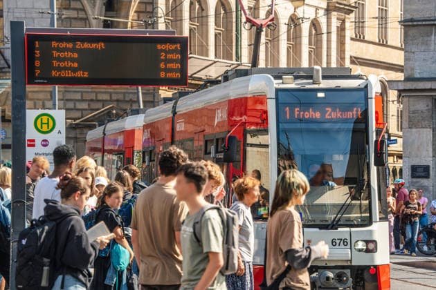 Tram Line 1 heading toward Frohe Zukunft stops at the Marktplatz stop, Halle Saale, August 27, 2026, Germany, Halle Saale, August 2026, Tram Line 1 heading toward Frohe Zukunft stops at the Marktplatz stop in the city center. Frohe Zukunft is actually a neighborhood in the north of Halle, named after the former Frohe Zukunft lignite mine, HAVAG,