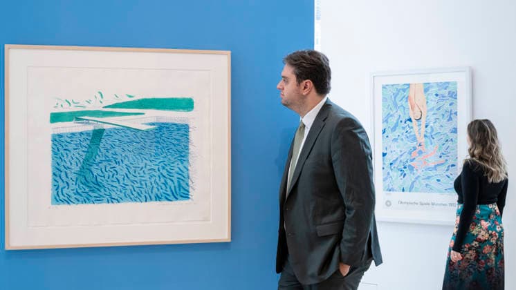 September 11, 2026, London, London, UK: LONDON, UK. (L) Lithographic Water Made of Lines, Crayon, and a Blue Wash by David Hockney (Estimate £100,000â€150,000) and Olympische Spiele Mo¼nchen Olympic Games Munich by David Hockney (Estimate £1,000â€1,500) at a preview of upcoming autumn auctions at Phillips in Berkeley Square. The David Hockney, Modernism and Editions Evening and Online auctions take place in September. London UK - ZUMAl94_ 20260911_zaf_l94_011 Copyright: xStephenxChungx