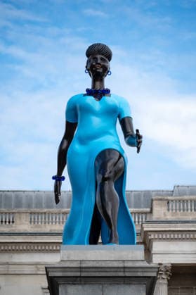 September 12, 2026, London, United Kingdom: Sculpture Lady in Blue with the National Gallery in the background in Trafalgar Square, London. Lady in Blue, a bronze sculpture by New York-based artist Tschabalala Self, stands on the Fourth Plinth in Trafalgar Square, London. Unveiled on 10 September, the work pays homage to a young metropolitan woman of colour and was created as a contemporary everywoman representing the diversity of London today. The sculpture explores themes of representation, recognition and equity, presenting an everyday woman walking forward into a shared future rather than a traditional historical figure or monument. The bronze sculpture is patinated in Lapis Lazuli blue, a pigment with a long history across North - ZUMAs197 20260912_aaa_s197_271 Copyright: xAndreaxDomeniconix