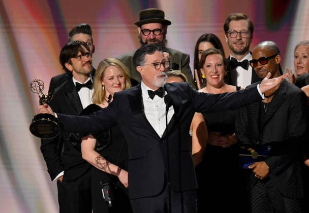 Cast and crew including Ariel Dumas, Opus Moreschi, Lauren Marcello, Sara Vilkomerson, Gabriel W Gronli, Stephen Colbert, Paul Dinello, Bjoern Stejskal, Tanya Michnevich Bracco, Matt Lappin, Michael R Brumm and Aaron Cohen accept the Outstanding Variety Series Award for The Late Show with Stephen Colbert on stage during the 78th annual Primetime Emmy Awards at the Peacock Theater in Los Angeles on Monday, September 14, 2026. LAP20260914128 JIMxRUYMEN