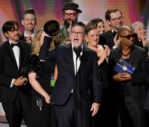 Stephen Colbert (C) holds the Emmy as crew including Ariel Dumas, Opus Moreschi, Lauren Marcello, Sara Vilkomerson, Gabriel W Gronli, Stephen Colbert, Paul Dinello, Bjoern Stejskal, Tanya Michnevich Bracco, Matt Lappin, Michael R Brumm and Aaron Cohen accept the Outstanding Variety Series Award for The Late Show with Stephen Colbert on stage during the 78th annual Primetime Emmy Awards at the Peacock Theater in Los Angeles on Monday, September 14, 2026. LAP20260914907 JIMxRUYMEN