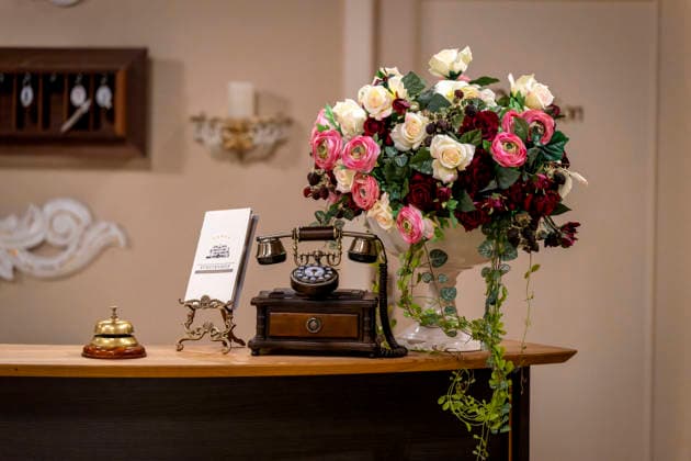 September 16, 2026, ARD telenovela *STURM DER LIEBE*, photo shoot for Season 23 on the film set in Munich, at Bavaria Film in Geiselgasteig, in the studio set of the fictional Hotel Fürstenhof reception area with a telephone and doorbell, September 16, 2026, ARD series *Sturm der Liebe* September 16, 2026, ARD series *Sturm der Liebe*