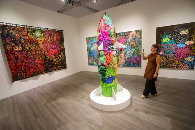 September 20, 2026, Surabaya, East Java, Indonesia: A visitor takes a photo of a contemporary artwork at the ArtSubs 2026 exhibition at Balai Pemuda, Surabaya, East Java, Indonesia, on September 20, 2026. Titled border, threshold, beyond, the art exhibition features 500 works by 113 artists from across Indonesia, serving as a response to the public s need for a space of contemplation, reflection, and entertainment. Surabaya Indonesia - ZUMAp290 20260920_zip_p290_027 Copyright: xRendyxAgungxPrakosox