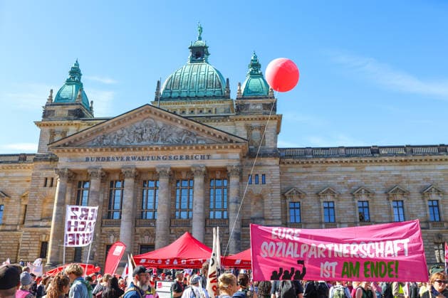 September 26, 2026, Leipzig, Saxony, Germany: Demonstrators take part in a rally in Leipzig, Germany, on September 26, 2026, as part of nationwide trade union-led protests calling for the protection of social welfare, workersâ€⠢ rights and social security. Protesters gathered in the city carrying banners, placards and flags, while speakers addressed the crowd about issues including employment, pensions, healthcare and social protection. The demonstration was organized in the context of a nationwide day of action by the German Trade Union Confederation (DGB). The rally brought together workers, trade union members and other participants in central Leipzig Leipzig Germany - ZUMAc291 20260926_zip_c291_003 Copyright: xMariaxCastrox
