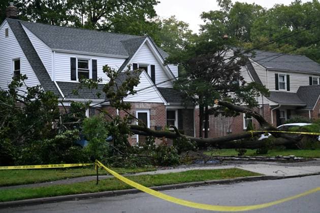 September 27, 2026, Ridgewood, New Jersey, USA: A tree is seen uprooted with wires down outside of a home on Gilbert Street during a nor easter storm in Ridgewood, New Jersey, United States, on Sunday, September 27, 2026. Heavy rain and strong winds battered the northeastern United States as an unusually powerful autumn storm intensified, forcing the cancellation of hundreds of flights and leaving tens of thousands of people without power. New York, Boston and Philadelphia were among the areas affected by the storm, as authorities warned of potential major flooding and road closures. Ridgewood USA - ZUMAs197 20260927_aaa_s197_004 Copyright: xKylexMazzax