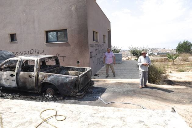 September 28, 2026, Ramallah, Palestine, State of: DEIR ABU MASHAâ€⠢AL, PALESTINE †SEPTEMBER 28, 2026: Israeli settlers attacked the village of Deir Abu Mashâ€⠢al, northwest of Ramallah, during the early hours of the morning, according to local sources. During the attack, settlers set fire to a vehicle belonging to Ahmed Shehadeh Zahran, also known as Abu Zaher, and spray-painted slogans on the walls of his home. The incident is part of a series of reported settler attacks affecting Palestinian communities in the occupied West Bank. Ramallah Palestine, State of - ZUMAq101 20260928_zna_q101_011 Copyright: xSalmanxMohsenxAlkhatibx