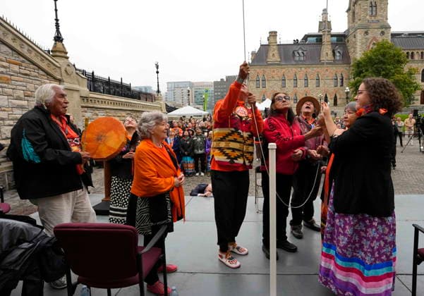 September 30, 2026, Ottawa, On, CANADA: Residential School Survivors Eugene Arcand, centre, Bernard Andreason, Antoine Mountain and Jeanette Wawatie, second from right, raise the Survivor s Flag during a re-raising ceremony with Gov. Gen. Louise Arbour, second from left, and Minister of Crown-Indigenous Relations Rebecca Alty, right, on Parliament Hill in Ottawa on National Day for Truth and Reconciliation, Wednesday, Sept. 30, 2026. Ottawa CANADA - ZUMAc35_ 20260930_zaf_c35_004 Copyright: xJustinxTangx