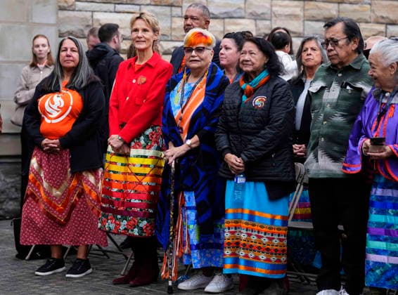 September 30, 2026, Ottawa, On, CAN: Diana Fox Carney, wife of Prime Minister Mark Carney, wears a ribbon skirt as she stands with Stephanie Scott, executive director of the National Centre for Truth and Reconciliation, left, and Residential School Survivors including Jacquie Bouvier, centre, during the re-raising of the Survivor s Flag ceremony on Parliament Hill in Ottawa, on National Day for Truth and Reconciliation, Wednesday, Sept. 30, 2026. Ottawa CAN - ZUMAc35_ 20260930_zaf_c35_011 Copyright: xJustinxTangx