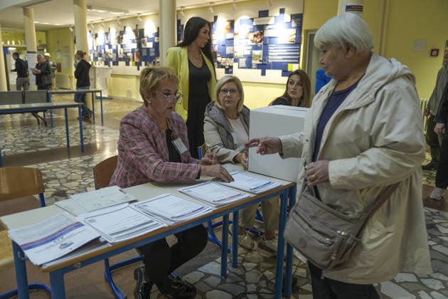 Voters cast ballots in Sarajevo as Bosnia and Herzegovina holds general elections SARAJEVO, BOSNIA AND HERZEGOVINA - OCTOBER 04: Voters cast their ballots as polling stations open for the 2026 General Elections in Sarajevo, Bosnia and Herzegovina on October 04, 2026. The nationwide vote features the inaugural use of new electoral technologies, including biometric voter identification, optical ballot scanners, and automated result transmission systems. Citizens are voting to elect members of the tripartite Presidency of Bosnia and Herzegovina, deputies to the Parliamentary Assembly, the Federation of BiH Parliament, the President and Vice Presidents of Republika Srpska, the National Assembly of Republika Srpska, and cantonal assemblies. Sami Copyright: x2026xAnadoluxSamirxJordamovicx
